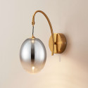 Applique dorata LED ad arco con globo ovale sospeso - Nuvéo