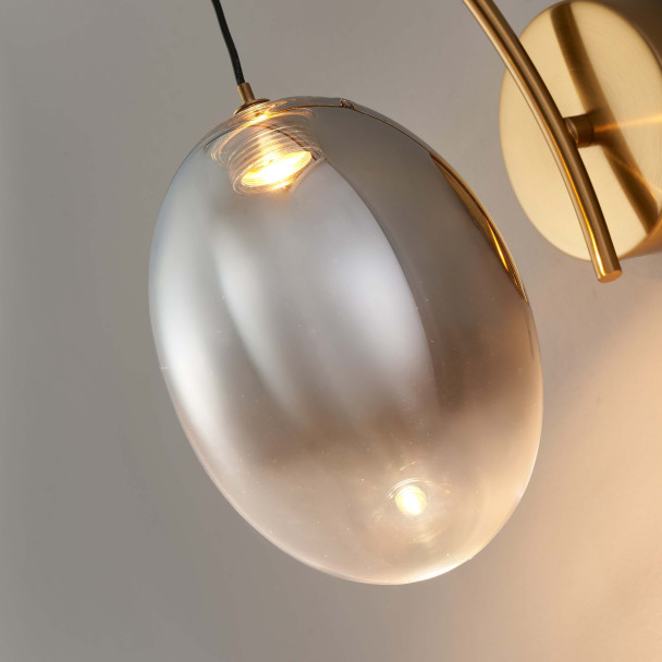 Applique dorata LED ad arco con globo ovale...
