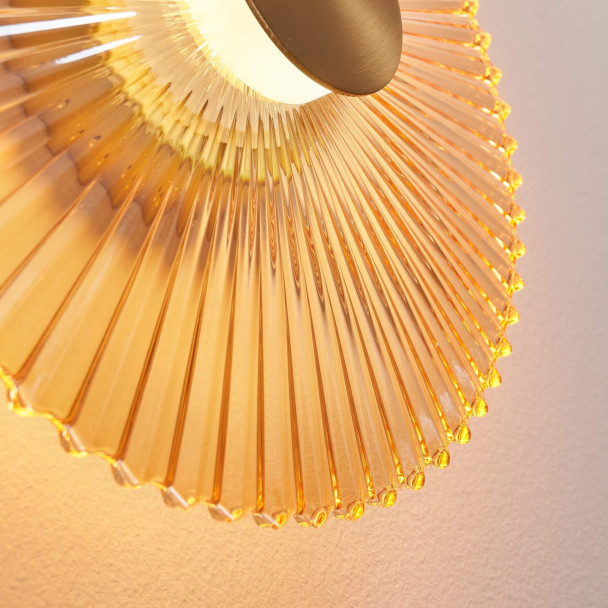 Applique di design dorata con disco plissettato...