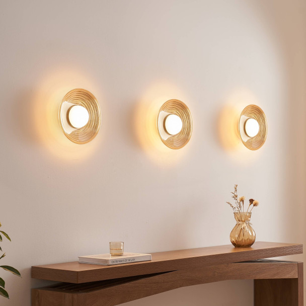 Applique LED di design rotonda in vetro ambrato...