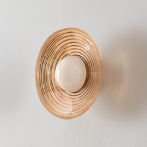 Applique LED di design rotonda in vetro ambrato...