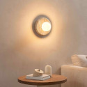 Applique decorativa rotonda in travertino e vetro bianco - Milenka